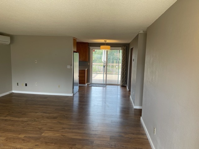 Large living room with hardwood floors - 20229 125th Plz SE