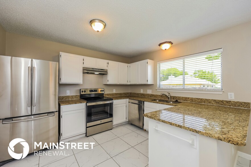 Building Photo - 6818 Still Lake Dr