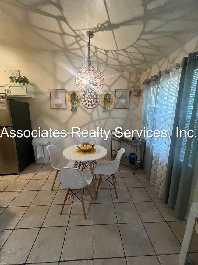 Building Photo - Beautifully furnished  2-Bedroom Duplex – ...