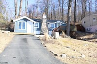 Building Photo - 4 Log Cabin Terrace