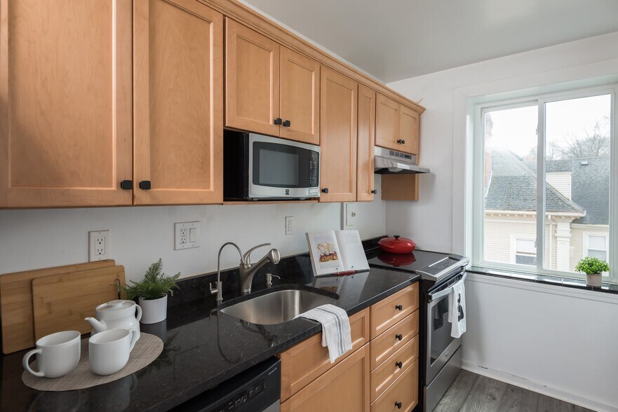 Updated Kitchen with new appliances - 125 Pleasant St