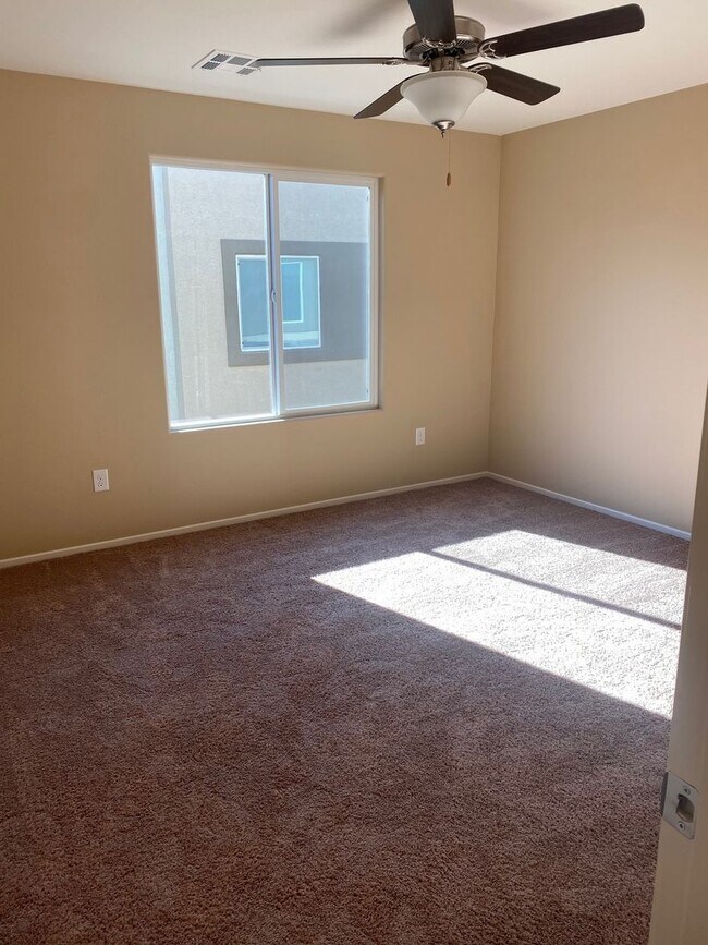 Building Photo - Spacious Townhouse with Loft & Rare 3-Car Garage!