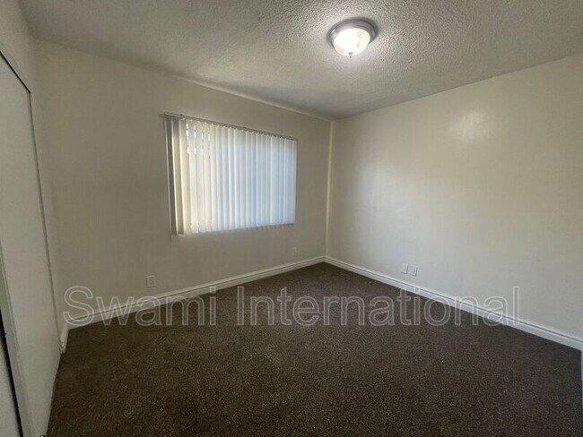 Building Photo - 10970 S Figueroa St