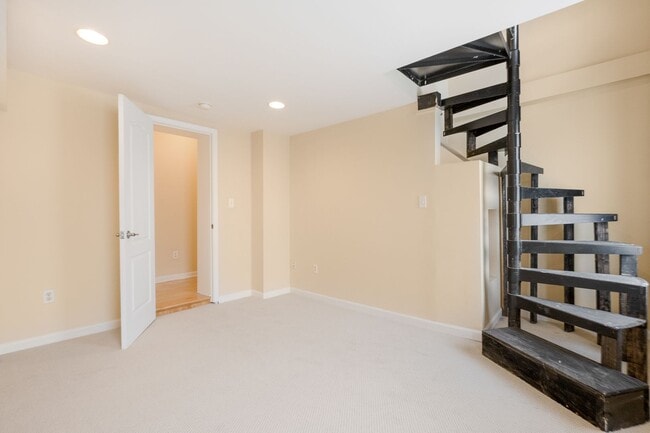 Building Photo - Spacious 2BR/2.5BA Townhome with Finished Basement & Extra Storage