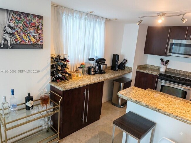 Building Photo - 7600 Collins Ave