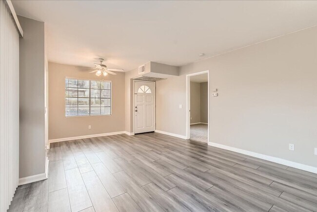 Building Photo - Spacious 1-Bedroom Condo with Modern Comfo...