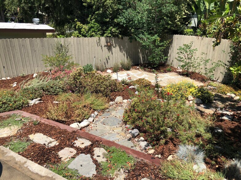 Lower backyard seating area - 125 Brocadero Pl