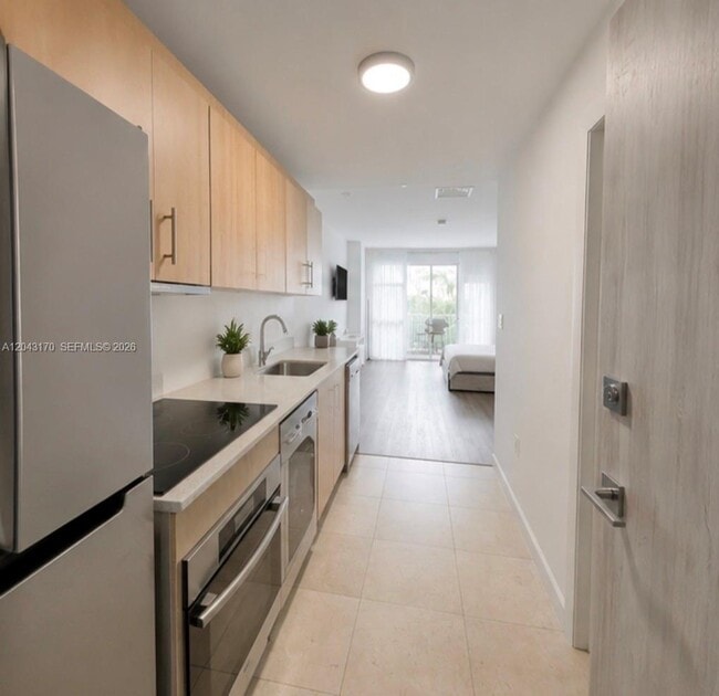 Building Photo - 10275 Collins Ave