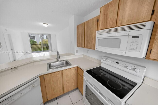 Building Photo - 8750 N Sherman Cir