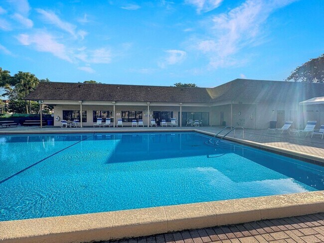 Building Photo - 6090 N Sabal Palm Blvd