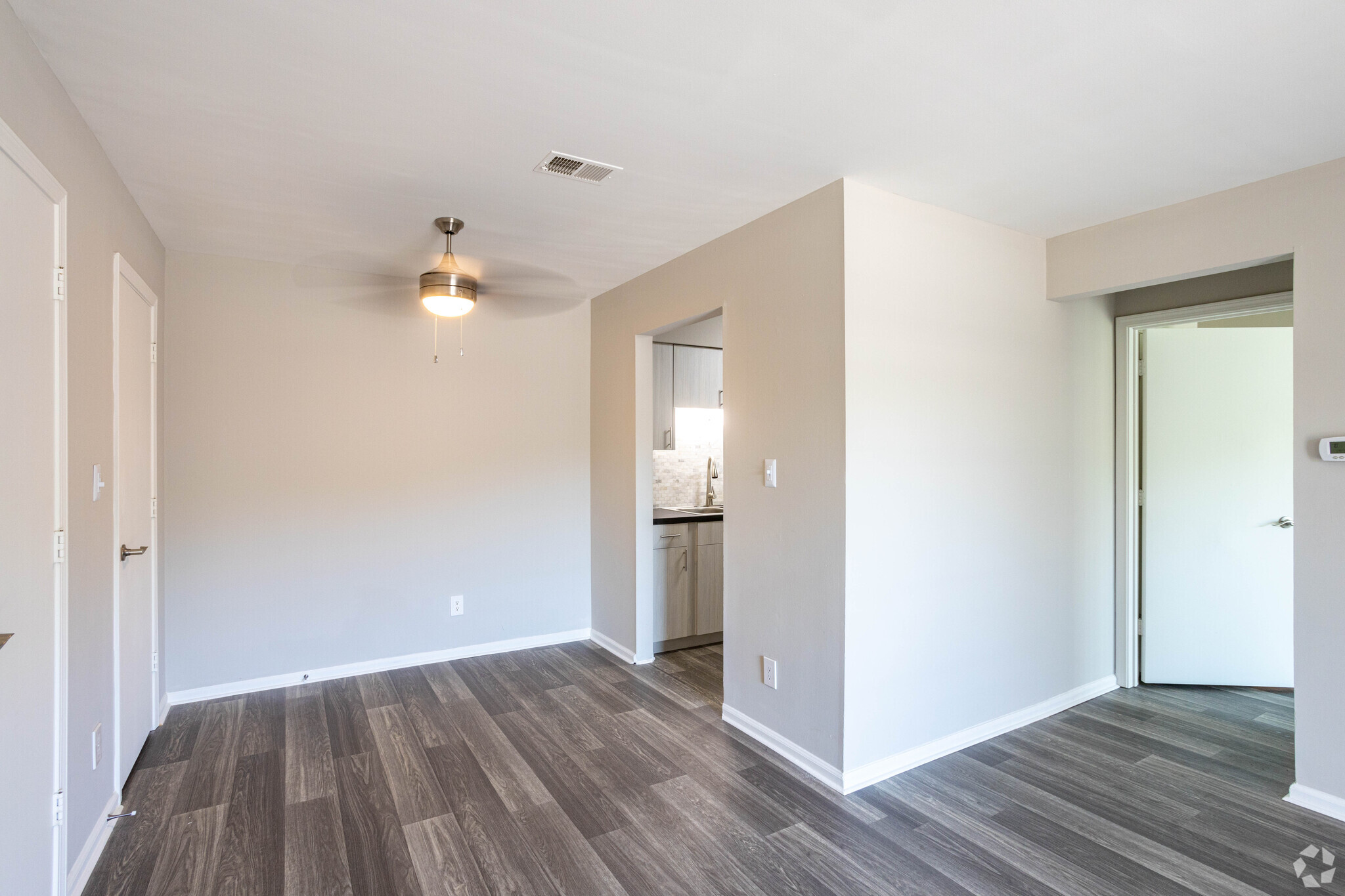 (R) RENOVATED THE FLOWERING DOGWOOD 1BR, 1BA - 700 SF - Living Room and Dining Area - Woodbridge Place