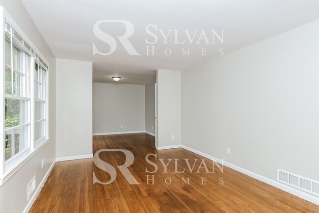 Building Photo - Turn the key. Enter. Smile. Repeat every day!