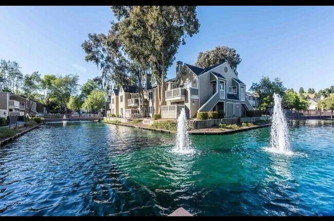 Building Photo - Beautiful 2-Bedroom Condo with Serene Wate...