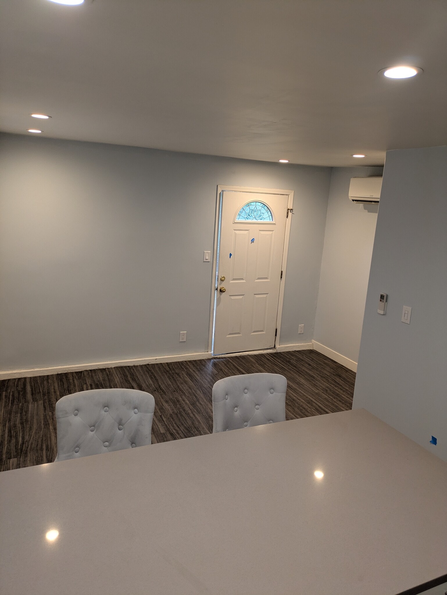Peninsula (quartz) and living room, looking at front door - 17915 Erwin St