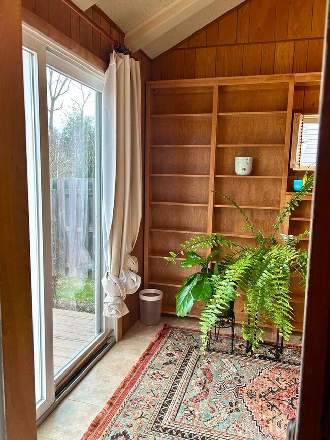 Building Photo - Sunroom Retreat | Fully Furnished 3BR with Private Fenced Yard