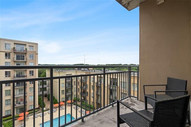 Building Photo - 711 Cosmopolitan Dr NE