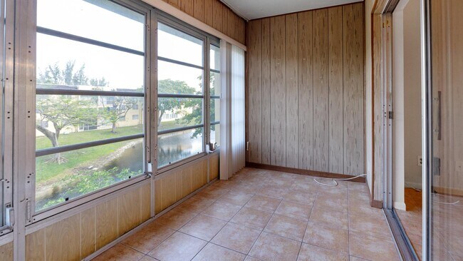 Building Photo - 5890 NW 64th Ave