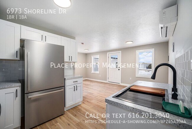 Building Photo - 6973 Shoreline Dr