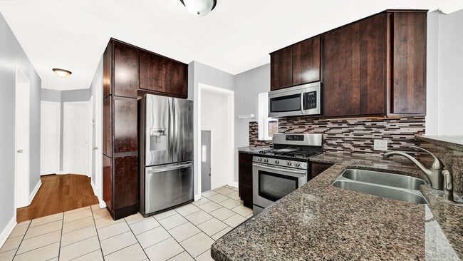 Building Photo - 5542 S Neva Ave