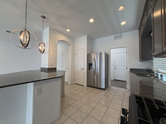 Building Photo - 7869 Tyrell Peaks St