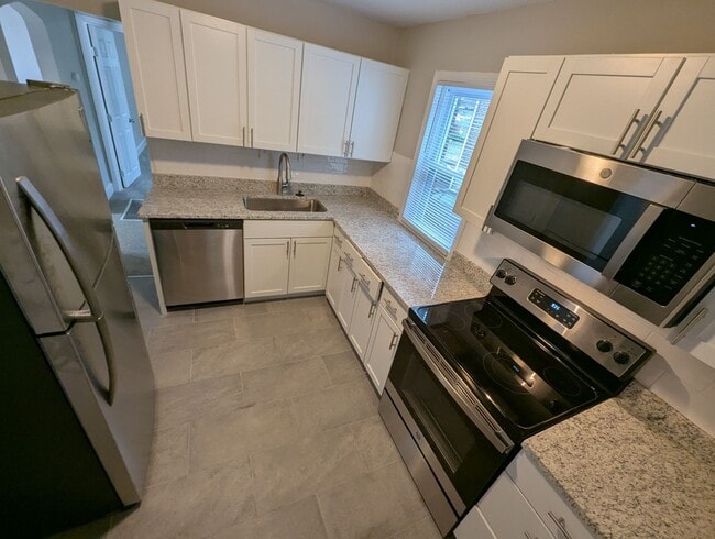 Building Photo - Take Aim at Fletcher - $1000 Security Deposit & 1/2 Off Your First Month!