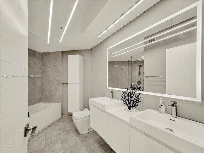 Building Photo - 6365 Collins Ave