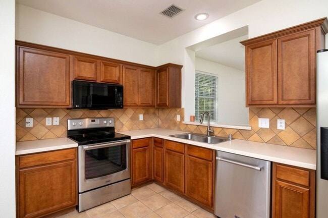 Building Photo - Townhome in Parker Estates!! READY for move in early June