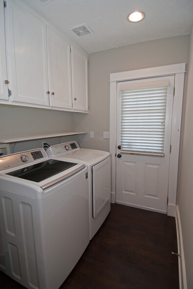Laundry room with east entrance - 60 W Lewis Ave