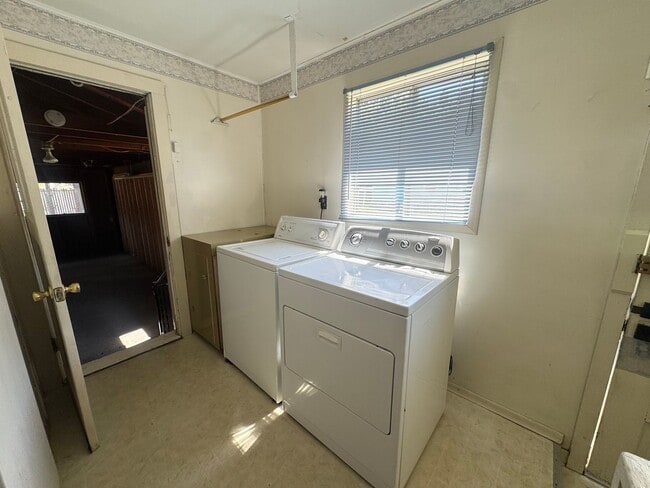 Building Photo - Spacious & Updated Home with Bonus Room, Large Basement, & Garage