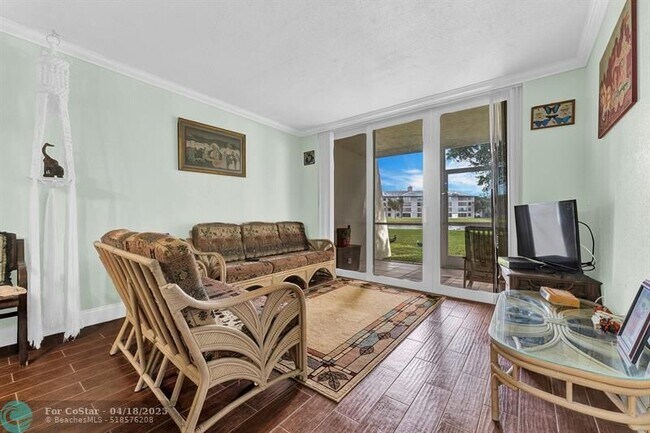 Building Photo - 9430 Poinciana Pl