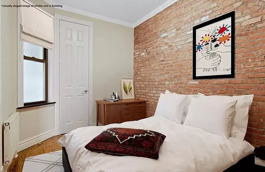 Building Photo - 410 E 13th St