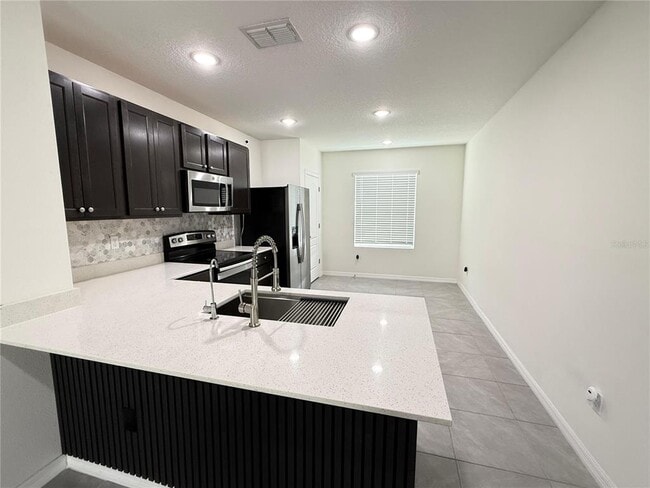 Building Photo - 9001 Wildflower Ln