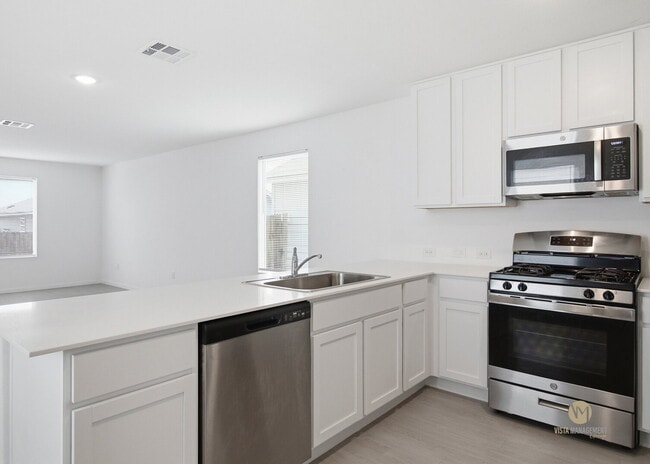 Building Photo - Welcome home to Ruby Crossing!