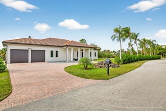 Building Photo - Newly built upscale home on a private 1-acre lot in the quiet Bell Villa community of Bonita Spri...