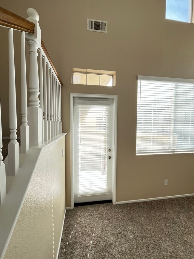 Building Photo - PICTURE PERFECT!  3 BR/3 BA END UNIT CONDO with DIRECT ACCESS 2 CAR GARAGE