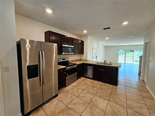 Building Photo - 9022 Wildflower Ln