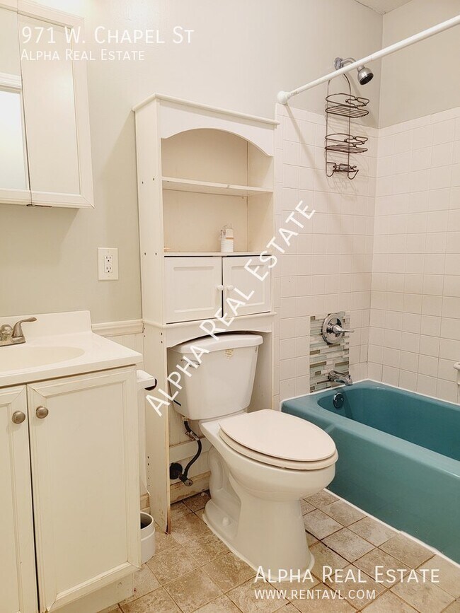 Building Photo - Pet friendly home with level fenced back y...