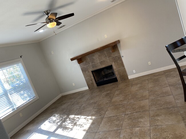 Living room with gas fireplace - 606 South A Ave.