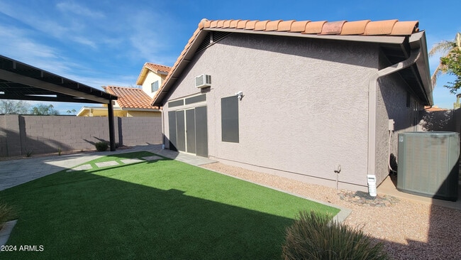 Building Photo - 8817 E Dahlia Dr