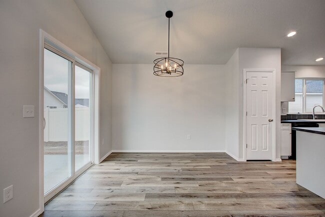 Building Photo - The 3 bedroom, 2 bedroom home also has a f...