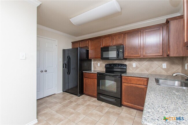 Building Photo - 4701 Green Meadow St