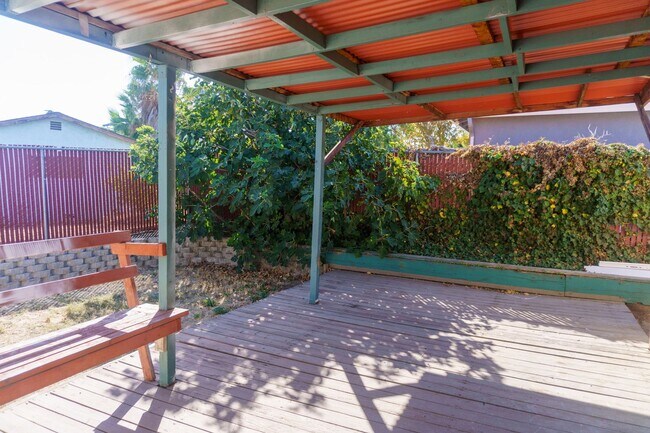 Building Photo - Spacious Three Bedroom, Two Bathroom House featuring Two Car Garage With Huge Yard