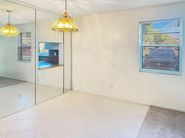Building Photo - 6090 N Sabal Palm Blvd