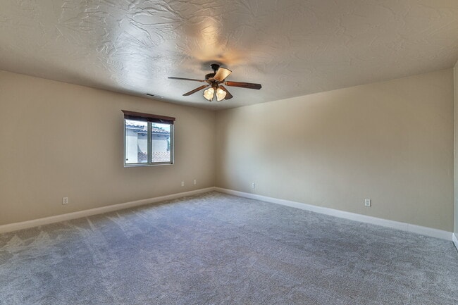 Building Photo - "Spacious 4-Bedroom Retreat with 3,584 Sq ...