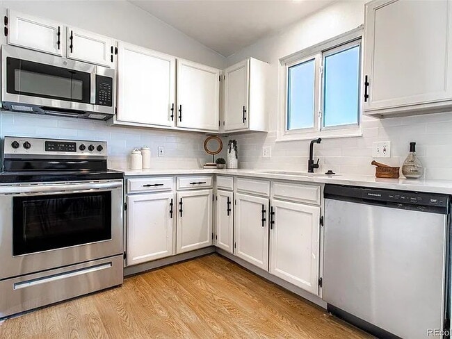 Building Photo - Lovely 4-Bedroom, 2-Bath Home in Aurora with Large Backyard and 2-Car Attached Garage!