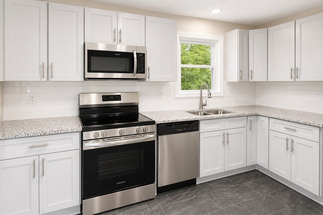 Building Photo - “Two Living Spaces. One Incredible Opportunity