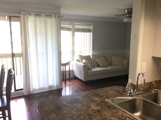 Building Photo - SOON AVAILABLE POOLSIDE CONDO!