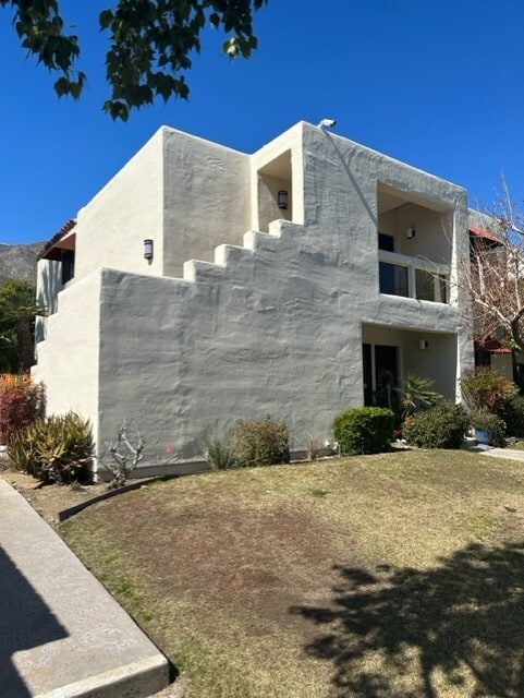 Private entry staircase to front door. - 255 E Avenida Granada