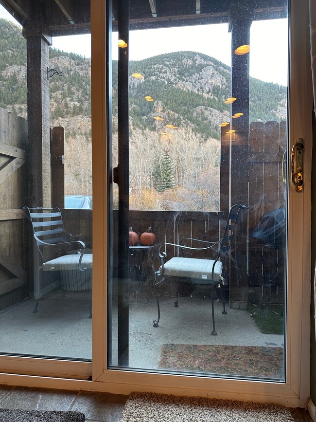 Private covered patio with Dutch Door fence - 1890 Argentine St