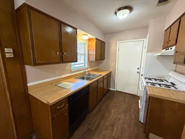 Building Photo - NICE 3 BEDROOM HOME WITH 2 FULL BATHS IN NORTH EAST IND. SCHOOL DISTRICT FEATURING VINYL PLANK "W...